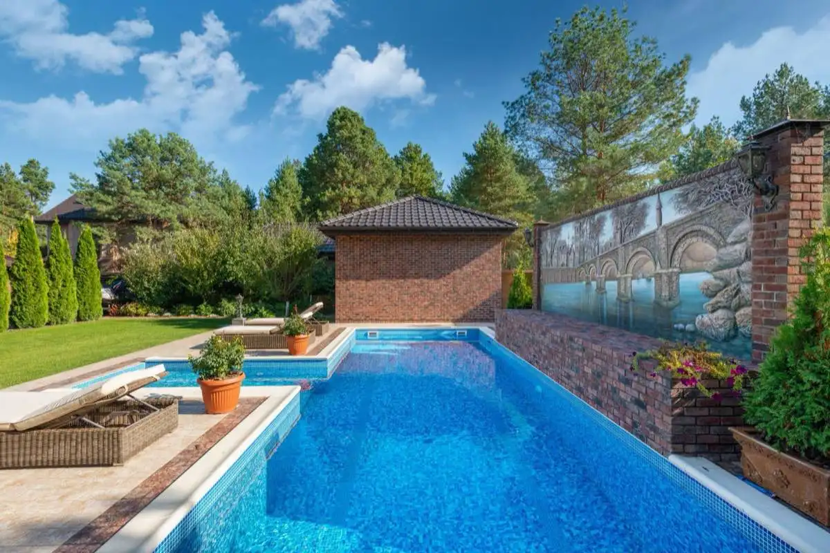 Backyard saltwater swimming pool in Long Beach, CA on a clear day